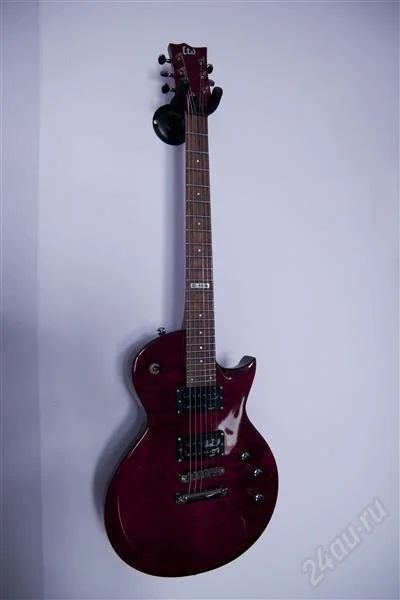 Лот: 1563566. Фото: 1. Электрогитара ESP LTD EC-100QM. Гитары