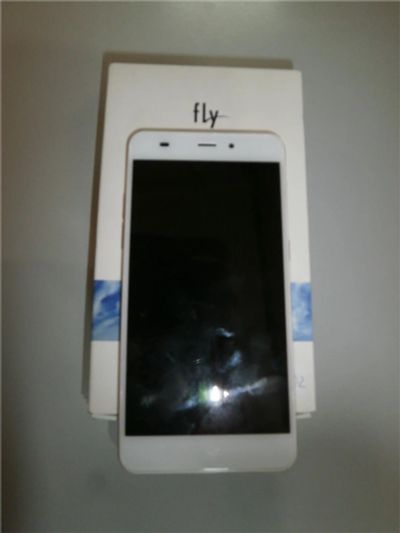 Лот: 11289411. Фото: 1. Fly fs523 Cirrus 16 (0304-02). Смартфоны