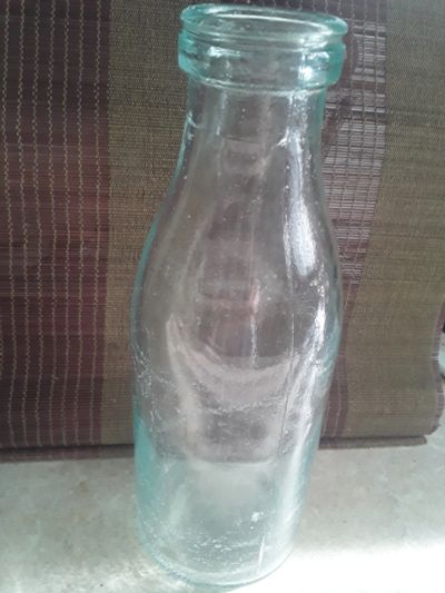 Лот: 19054060. Фото: 1. Молочная бутылка из прошлого. Предметы интерьера и быта