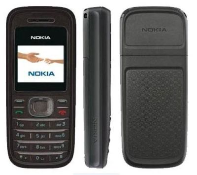 Лот: 9946150. Фото: 1. Сотовый телефон NOKIA 1208 + зарядное... Кнопочные мобильные телефоны