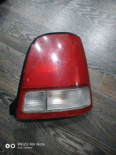 Лот: 14619746. Фото: 1. Задний фонарь Хонда Лого Honda... Оптика и освещение