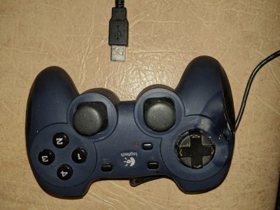 Лот: 12493888. Фото: 1. Геймпад Logitech Dual Action. Рули, джойстики