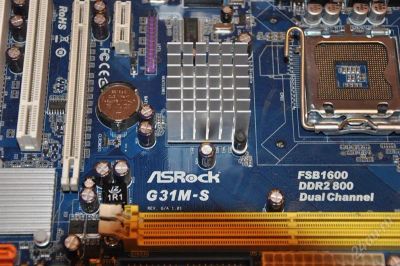 Лот: 952087. Фото: 1. Материнская плата Asrock G31M-S. Материнские платы