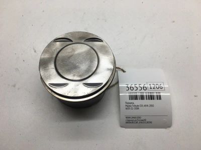 Лот: 20387973. Фото: 1. Поршень Mazda Tribute 2002 AJ0311100A... Двигатель и элементы двигателя