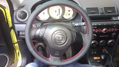 Лот: 9415258. Фото: 1. Кожаная накладка на руль Mazda... Салон