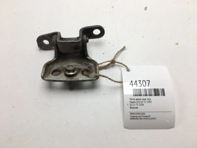 Лот: 20391412. Фото: 1. Петля двери Mazda 626 1992 G21173210A... Кузов