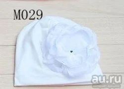 Лот: 10025339. Фото: 1. Шапочка с цветочком. Головные уборы