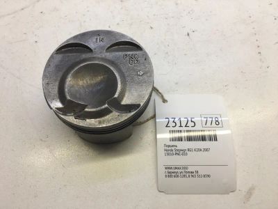 Лот: 20382253. Фото: 1. Поршень Honda Stepwgn 2007 13010PNC010... Двигатель и элементы двигателя