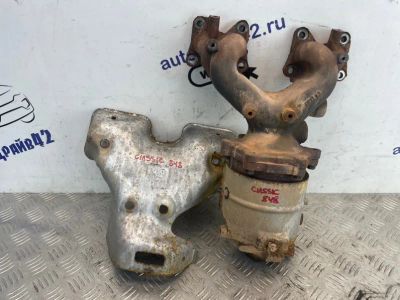 Лот: 24591807. Фото: 1. коллектор выпускной Nissan Almera... Двигатель и элементы двигателя