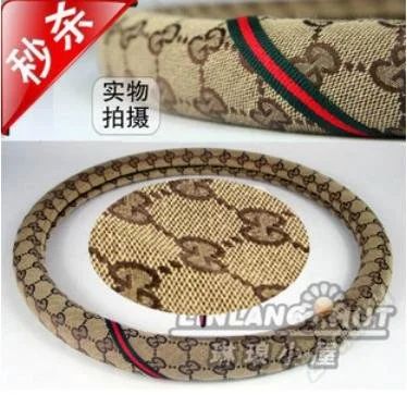 Лот: 980286. Фото: 1. Оплётка на руль Gucci. Чехлы, коврики, оплетки руля