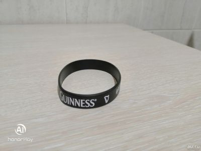 Лот: 15108977. Фото: 1. Резиновый браслет Guinness (оригинал... Другое (сувениры, подарки)