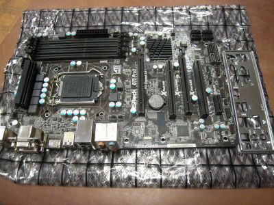 Лот: 11203478. Фото: 1. Материнская плата 1155 AsRock... Материнские платы