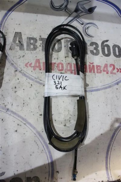 Лот: 21718465. Фото: 1. тросик лючка топливного бака Honda... Топливная система