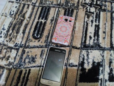Лот: 10309442. Фото: 1. Смартфон Samsung galaxy j1 mini. Смартфоны