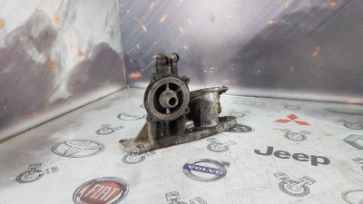 Лот: 23588490. Фото: 1. Крепление масляного фильтра Mazda... Расходные материалы