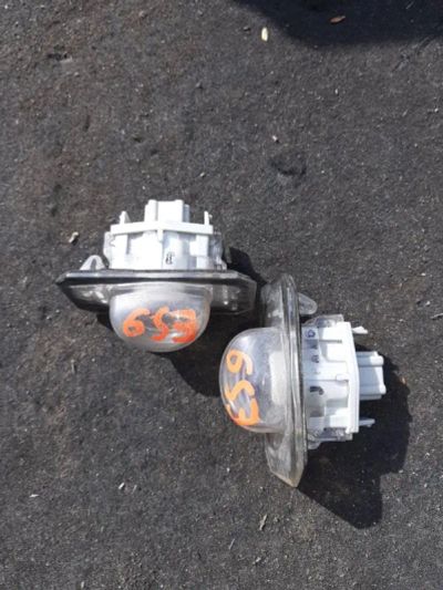 Лот: 21411451. Фото: 1. подсветка номера Honda Civic ES9. Двигатель и элементы двигателя