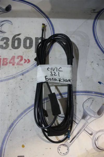 Лот: 21718460. Фото: 1. тросик багажника Honda Civic Ferio... Двигатель и элементы двигателя
