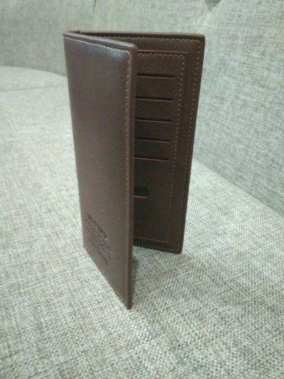 Лот: 9609412. Фото: 1. Новый коричневый кошелёк. Бумажники, кошельки, портмоне