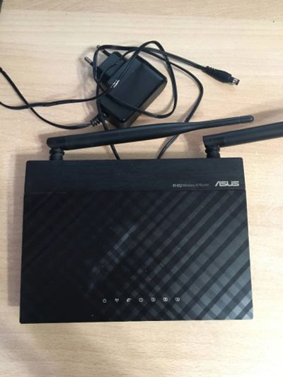 Лот: 18982812. Фото: 1. Роутер Asus RT-N12. Маршрутизаторы (роутеры)
