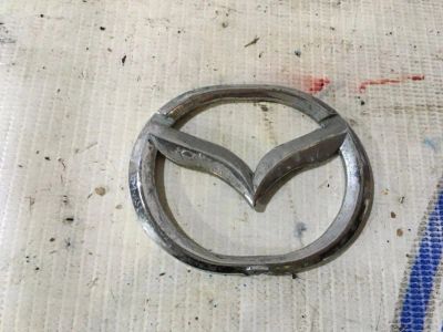 Лот: 21719214. Фото: 1. эмблема Mazda Demio DW3W. Двигатель и элементы двигателя