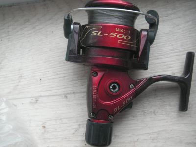 Лот: 25358636. Фото: 1. Спиннинговая катушка SL-500 c... Катушки, комплектующие