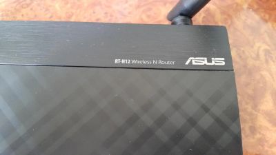 Лот: 7726977. Фото: 1. Wi-Fi роутер ASUS RT-N12. Маршрутизаторы (роутеры)