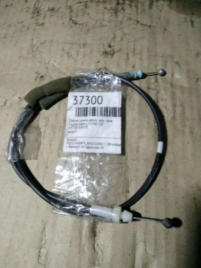 Лот: 21410466. Фото: 1. Тросик замка двери Toyota Camry... Двигатель и элементы двигателя