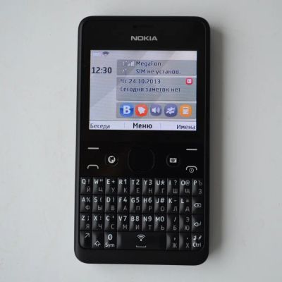 Лот: 3319309. Фото: 1. Nokia Asha 210 Dual Sim black... Кнопочные мобильные телефоны