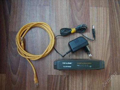Лот: 1908763. Фото: 1. Коммутатор TP-Link TL-SF1005D. Маршрутизаторы (роутеры)