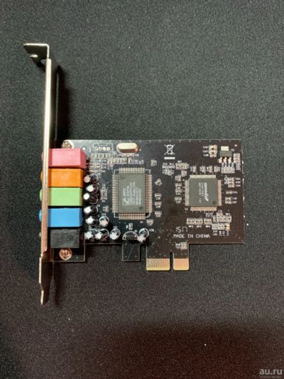 Лот: 17981050. Фото: 1. Звуковая карта в слот PCI-E 1X... Звуковые карты