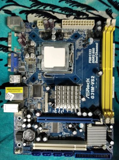 Лот: 16687593. Фото: 1. Asrock G35M-VS2. Материнские платы