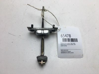 Лот: 20403865. Фото: 1. Ограничитель двери Mazda Demio... Кузов