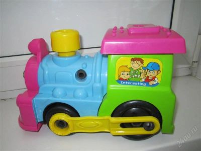 Лот: 2592003. Фото: 1. Забавный яркий паровозик. Машины и техника