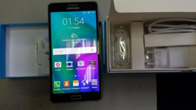 Лот: 5720863. Фото: 1. Samsung SM-A700F Galaxy A7 bl. Смартфоны
