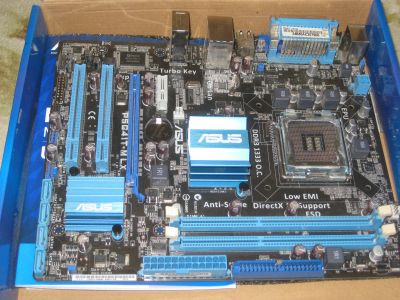 Лот: 16272395. Фото: 1. Asus P5G41T-M LX. Материнские платы