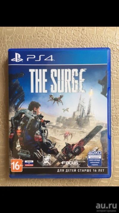Лот: 13540730. Фото: 1. The surge ps4. Игры для консолей
