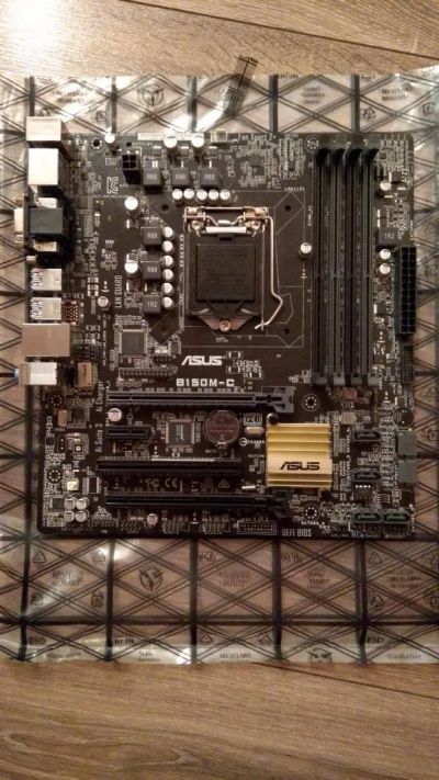 Лот: 11141869. Фото: 1. Asus B150M-C. Материнские платы