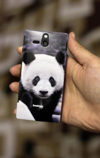 Лот: 4147896. Фото: 1. Sony Xperia U + чехол "панда... Смартфоны