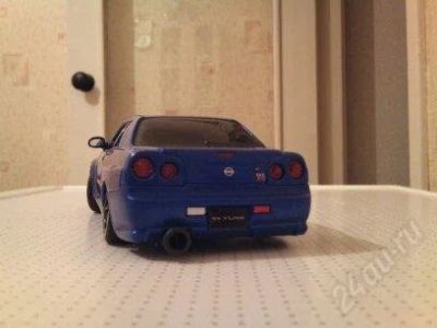 Лот: 1670898. Фото: 1. nissan skyline GT-R 34 1:24. Автомоделизм