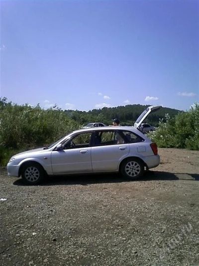 Лот: 1124811. Фото: 1. Mazda Familia. Автомобили