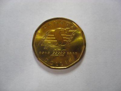 Лот: 6325377. Фото: 1. Канада, 1 доллар 2010 года. 100-лет... Америка