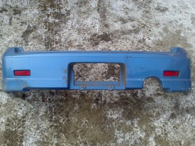 Лот: 5111030. Фото: 1. Задний бампер Nissan Cube. Кузов