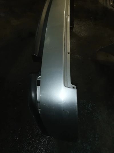 Лот: 15509603. Фото: 1. Бампер задний Nissan Wingroad... Кузов