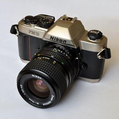 Лот: 4532010. Фото: 1. пленочный фотоаппарат Nikon FM10... Плёночные зеркальные