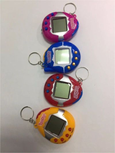 Лот: 10658474. Фото: 1. Игровая консоль Tamagotchi 168... Игры для консолей