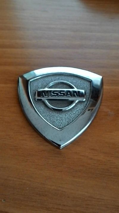 Лот: 9719609. Фото: 1. Эмблема (шильдик) Nissan. Наклейки автомобильные