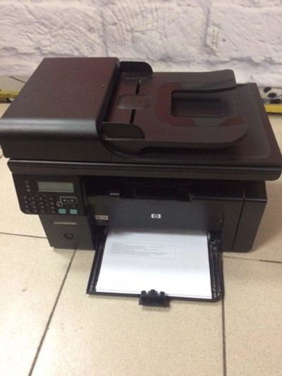 Лот: 12334514. Фото: 1. МФУ HP LaserJet Pro M1212nf MFP... МФУ и копировальные аппараты