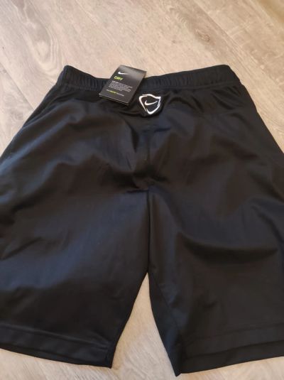 Лот: 20318173. Фото: 1. Шорты NIKE. Брюки, джинсы, шорты