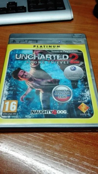 Лот: 7347952. Фото: 1. Uncharted 2: Among Thieves диск... Игры для консолей