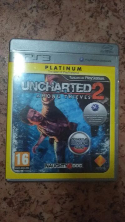 Лот: 15068050. Фото: 1. Uncharted 2: Among Thieves. Игры для консолей